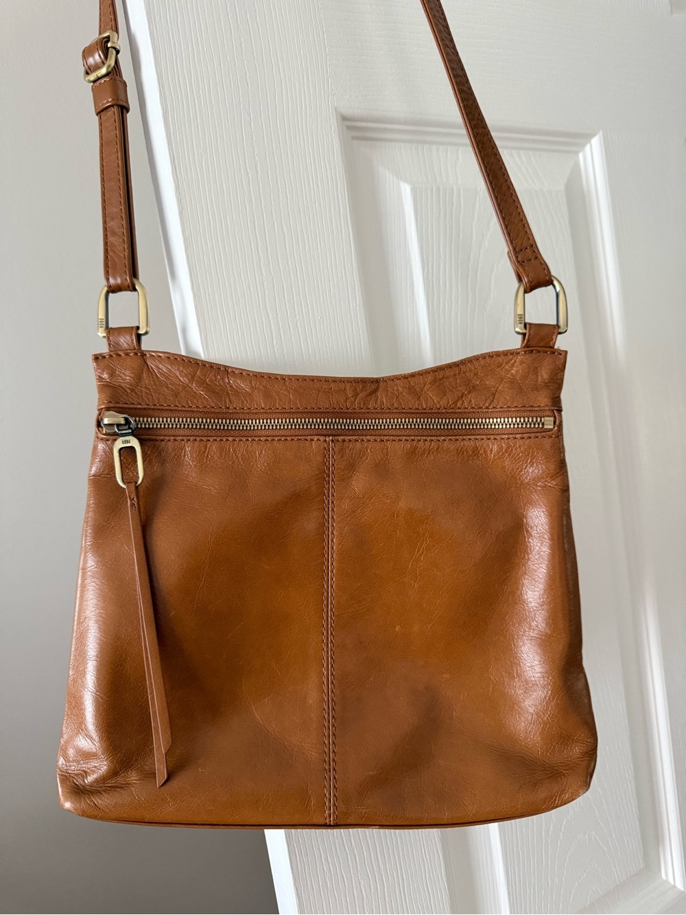 HOBO Leather Crossbody Bag with Brass Hardware